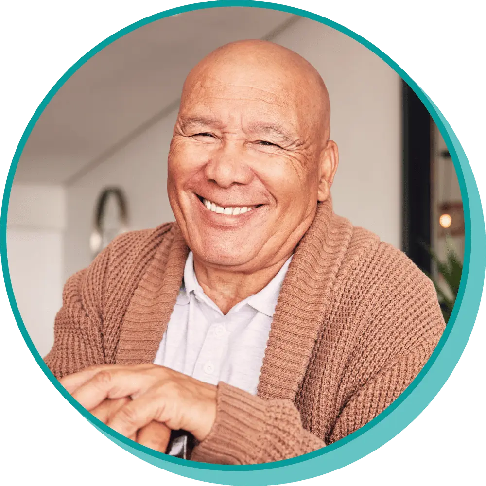 Elderly man smiling at camera