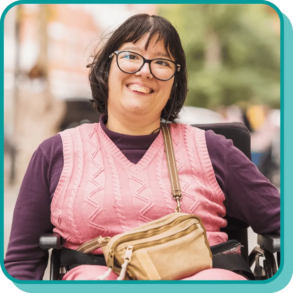 Disabled woman smiling happily at camera
