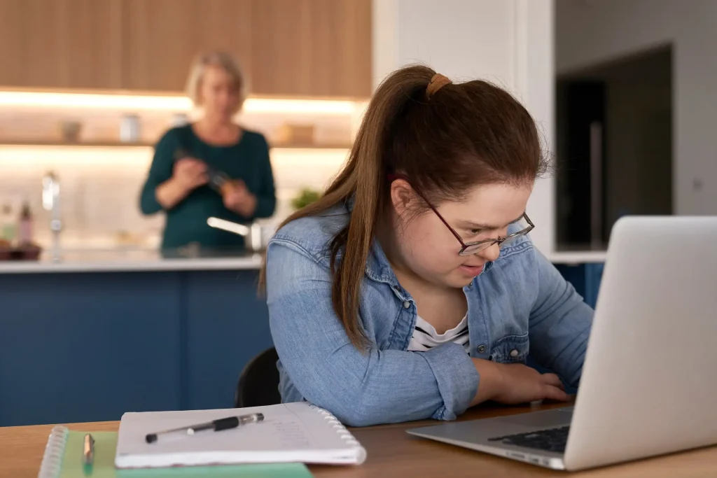 Disabled woman using laptop