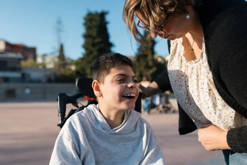 Mum with disabled son in wheelchair